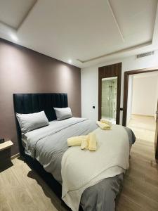 Giường trong phòng chung tại 3 bedroom apartment +9 ảnh