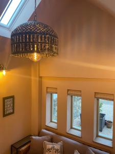 Et opholdsområde på The Hideaway & Sauna at Ring O'Bells