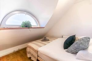 En eller flere senge i et værelse på Pokoje minutka do Monciaka