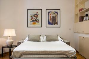 Łóżko lub łóżka w pokoju w obiekcie Cozy Loft @ Monti