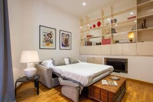 Łóżko lub łóżka w pokoju w obiekcie Cozy Loft @ Monti
