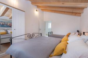 Ένα ή περισσότερα κρεβάτια σε δωμάτιο στο Villa Leana, a beautiful stone villa in a tranquil location +23 φωτογραφίες