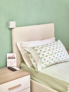 Postel nebo postele na pokoji v ubytování il rifugio di Francesca