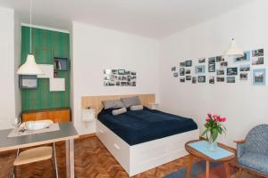Posteľ alebo postele v izbe v ubytovaní BudaFlats Apartments II.