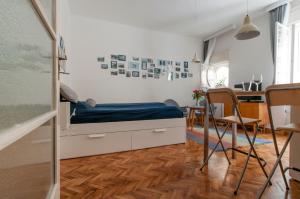 Posteľ alebo postele v izbe v ubytovaní BudaFlats Apartments II.
