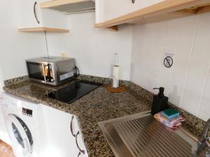 A kitchen or kitchenette at VV El Picón