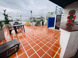 Rõdu või terrass majutusasutuses Hotel Metropolis Plaza Cali