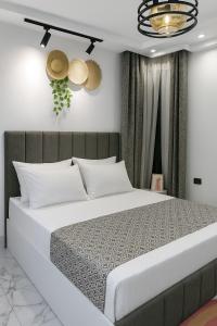 Ένα ή περισσότερα κρεβάτια σε δωμάτιο στο Dreamy Stay Porto Said
