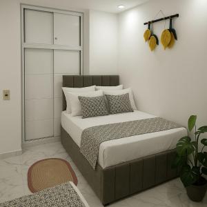 Ένα ή περισσότερα κρεβάτια σε δωμάτιο στο Dreamy Stay Porto Said +50 φωτογραφίες