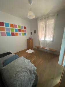 Postel nebo postele na pokoji v ubytování la Porte bleue