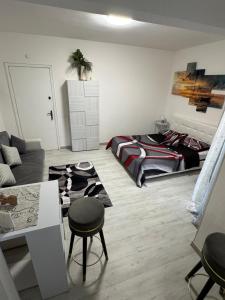 Ένα ή περισσότερα κρεβάτια σε δωμάτιο στο Di fronte al Lago