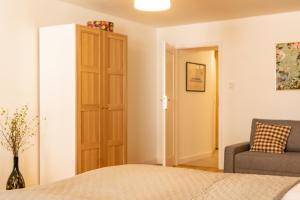Posteľ alebo postele v izbe v ubytovaní Cocorico Apartments