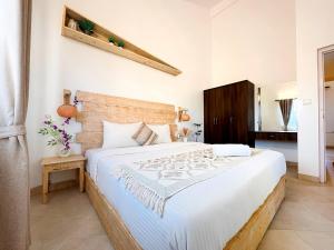 Ένα ή περισσότερα κρεβάτια σε δωμάτιο στο Assagao Serenity Newly Renovated +22 φωτογραφίες