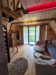 Posezení v ubytování Guest House Okropilauri