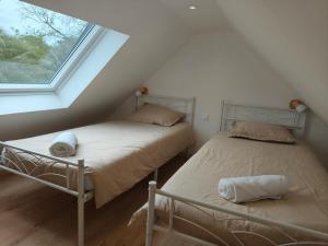 Ένα ή περισσότερα κρεβάτια σε δωμάτιο στο Villa des Agapanthes