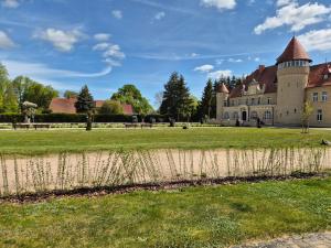 Taman di luar Die Remise Oleander RE-06 +8 gambar