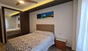 Postel nebo postele na pokoji v ubytování Apartamento con Piscina + 9 fotografií