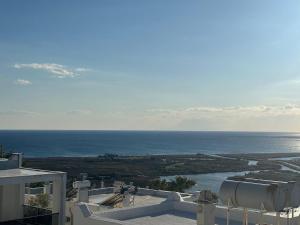 a view of the ocean from a building at Villa the Moon in Dalaman