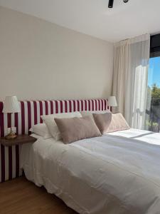 Katil atau katil-katil dalam bilik di Exceptional apartment 4 minutes from Carrasco Airport +14 gambar