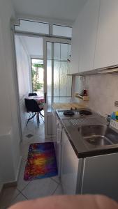 Kuchyň nebo kuchyňský kout v ubytování Apartments Gabriela