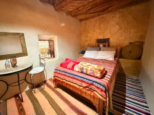 Postel nebo postele na pokoji v ubytování Saida Berber House + 37 fotografií