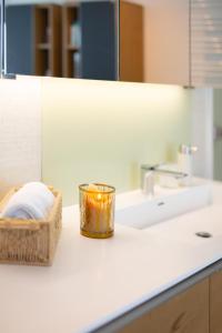 Dapur atau dapur kecil di Paradisio Poolsuite Summergold in Bodman am Bodensee