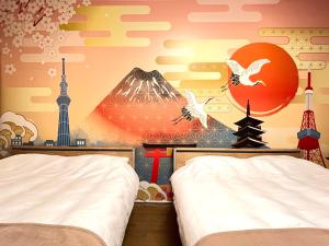 Postel nebo postele na pokoji v ubytování Camelot Annex