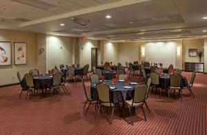 a conference room with tables and chairs in it at Hyatt Place Lincoln/Downtown-Haymarket in Lincoln +16 photos