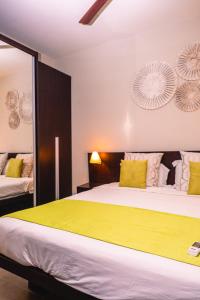 Katil atau katil-katil dalam bilik di Domaine des Alizees & Spa