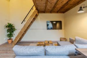 Et tv og/eller underholdning på Palmela Oásis Apartment II