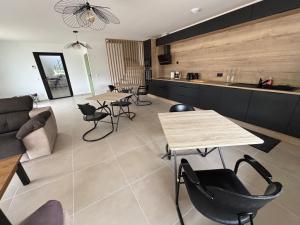 Posezení v ubytování Chambre d'hôtes AU CHAUVET