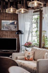 Χώρος καθιστικού στο Hotel Chalet Swiss