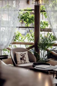 Χώρος καθιστικού στο Hotel Chalet Swiss