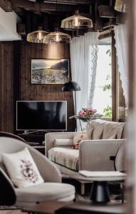 Χώρος καθιστικού στο Hotel Chalet Swiss