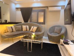 Posezení v ubytování luxury One bedroom apartment