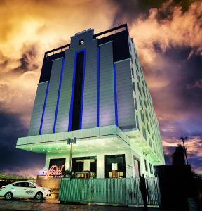 a building with a car parked in front of it at Effotel By Sayaji Indore in Indore