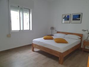 En eller flere senge i et værelse på Villa Arantxa + 11 billeder