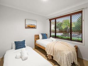 Ένα ή περισσότερα κρεβάτια σε δωμάτιο στο Family Oasis with Pool Living Rooms and Peaceful Vibes +22 φωτογραφίες