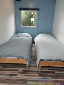 Ένα ή περισσότερα κρεβάτια σε δωμάτιο στο Chalet "In Toto"