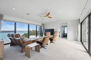 a living room with a table and chairs at Modern Coastal Retreat and Hot Tub in Carlton