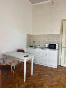 Kuchyň nebo kuchyňský kout v ubytování Newtone Apartment