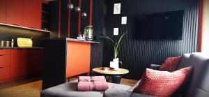 Χώρος καθιστικού στο Apartament Rock & Roll - Szczytno