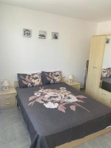 a bedroom with a bed and two night stands at Beachfront, 2 Bed with Sea Views in Elenite +13 photos