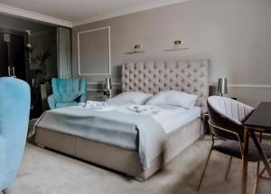 Postel nebo postele na pokoji v ubytování Apartamenty Atmosfera Bytów