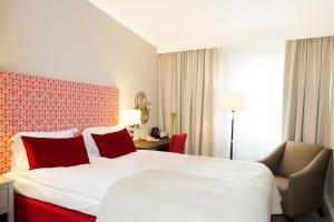 Letto o letti in una camera di Elite Stora Hotellet Linköping
