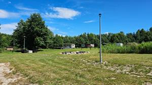 WygonDomek nad Jeziorem Okrągłe plaża, pomosty wędkarskie, kajaki, jacuzzi, sauna的相册照片 更多25张照片