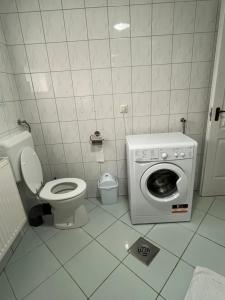 Kúpeľňa v ubytovaní Marcell Apartman