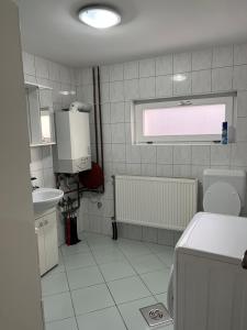 Kuchyňa alebo kuchynka v ubytovaní Marcell Apartman