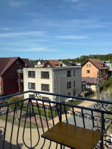 a view of a city from a balcony at Pensjonat Wiktoria in Międzywodzie +44 photos
