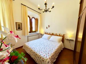 A bed or beds in a room at Casa Caterina